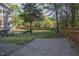 The backyard features a large grassy area, mature trees, and a gazebo at 119 W Vernon Ave, Wake Forest, NC 27587