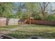 Backyard showcases a stone pathway to a cozy gazebo at 119 W Vernon Ave, Wake Forest, NC 27587