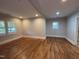 Spacious bedroom with hardwood floors and natural light at 119 W Vernon Ave, Wake Forest, NC 27587