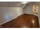 Bedroom featuring hardwood floors, natural light, and storage space at 119 W Vernon Ave, Wake Forest, NC 27587
