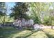 The backyard features a garage and well-maintained landscaping at 119 W Vernon Ave, Wake Forest, NC 27587