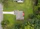 Aerial view of home with mature trees and a long driveway at 143 Cedarwood Dr, Henderson, NC 27536