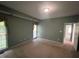 Spacious bedroom with large window letting in lots of natural light at 143 Cedarwood Dr, Henderson, NC 27536