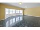 Large bonus room with natural light from many windows at 143 Cedarwood Dr, Henderson, NC 27536
