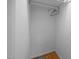 A walk-in closet with a basic closet rod for hanging clothes and personal storage at 143 Cedarwood Dr, Henderson, NC 27536