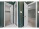 Hallway featuring doors leading to the bathroom, closet, and bedroom at 143 Cedarwood Dr, Henderson, NC 27536