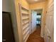 Hallway with built-in shelves at 143 Cedarwood Dr, Henderson, NC 27536