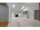 Bright living room with vaulted ceilings, fireplace, and built-ins, offering a cozy and inviting atmosphere at 143 Cedarwood Dr, Henderson, NC 27536