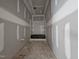 Bathroom featuring a tub with glass doors and unfinished walls at 157 Mildred Pl, Broadway, NC 27505