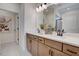 Bright bathroom featuring double sinks, modern fixtures, and neutral tones for a spa-like experience at 157 Mildred Pl, Broadway, NC 27505