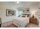 Comfortable bedroom with carpeted floors, natural light, and stylish decor for a relaxing retreat at 157 Mildred Pl, Broadway, NC 27505