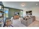 Comfortable living room area with plush seating, a TV, and neutral wall colors for a relaxing atmosphere at 157 Mildred Pl, Broadway, NC 27505