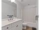 Neat bathroom with a single vanity, tub-shower combination, and a neutral color scheme at 180 Normandy Rd, Louisburg, NC 27549