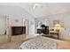 Bright bedroom featuring vaulted ceilings and a dedicated desk or office space for convenience at 180 Normandy Rd, Louisburg, NC 27549