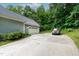 Spacious driveway leads to an attached garage for parking at 180 Normandy Rd, Louisburg, NC 27549
