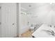 Bright bathroom with double sinks, a shower-tub combo, and tile flooring for a clean and modern feel at 1826 Fillmore Dr, Creedmoor, NC 27522