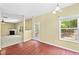Charming dining area with wood floors, bright window, and patio access at 1826 Fillmore Dr, Creedmoor, NC 27522