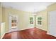Bright dining area with hardwood floors and access to the outdoor deck and backyard at 1826 Fillmore Dr, Creedmoor, NC 27522