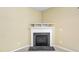 Close up of the living room fireplace with white mantle and black hearth at 1826 Fillmore Dr, Creedmoor, NC 27522