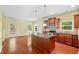 Modern kitchen featuring a granite island, stainless steel appliances, and plenty of cabinet space at 1826 Fillmore Dr, Creedmoor, NC 27522