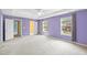 Large primary bedroom with tray ceiling, ceiling fan, and walk in closet at 1826 Fillmore Dr, Creedmoor, NC 27522