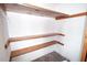 Walk in closet featuring simple storage and functionality at 205 N Augusta Ave, Benson, NC 27504