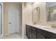 Bathroom boasts a double vanity with a large countertop and modern fixtures at 208 Jones Hill Rd, Holly Springs, NC 27540