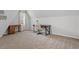 Spacious bedroom with a desk, chair, and good natural light from the window at 208 Jones Hill Rd, Holly Springs, NC 27540