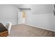 Bedroom featuring neutral walls, carpet, and access to another room at 208 Jones Hill Rd, Holly Springs, NC 27540
