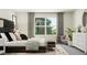 Bedroom featuring natural light, a comfy chair, and stylish furnishings at 215 Carova Bnd, Apex, NC 27539