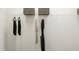 Organized walk-in closet with hanging clothes and overhead storage at 215 Carova Bnd, Apex, NC 27539