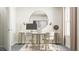 Stylish home office featuring a sleek desk, comfortable seating, and a large mirror, perfect for working from home at 215 Carova Bnd, Apex, NC 27539