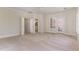 Bright bedroom with ceiling fan, access to private balcony, neutral carpet and ensuite bathroom at 218 W Barbee Chapel Rd, Chapel Hill, NC 27517
