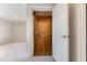 An elevator with a white door and wood interior provides access to all floors of the house at 218 W Barbee Chapel Rd, Chapel Hill, NC 27517
