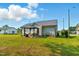 Beautiful backyard featuring a cozy gazebo, perfect for outdoor relaxation and entertainment at 221 Moon Cir, Dunn, NC 28334