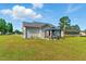 Spacious backyard with a gazebo, lush lawn, and well-maintained landscaping at 221 Moon Cir, Dunn, NC 28334