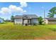 Expansive backyard featuring a gazebo with string lights for outdoor enjoyment at 221 Moon Cir, Dunn, NC 28334
