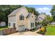 Charming two-story home with an attached garage, covered porch, and a manicured garden at 2216 Hoskins Rd, Burlington, NC 27215