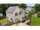 Charming two-story home with an attached garage, covered porch, and a manicured garden at 2216 Hoskins Rd, Burlington, NC 27215