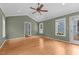 Inviting living room featuring hardwood floors, neutral paint, and a view into the backyard at 2216 Hoskins Rd, Burlington, NC 27215