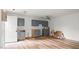 Spacious kitchen featuring new cabinets and hardwood floors at 2396 Spring Valley Rd, Henderson, NC 27537