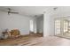 Living room featuring hardwood floors and an exterior door at 2396 Spring Valley Rd, Henderson, NC 27537