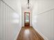 Inviting entryway with beautiful hardwood floors and wainscoting at 245 Tumbling River Dr, Wendell, NC 27591