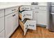 Kitchen cabinets and drawers with custom hardware and ample storage space at 245 Tumbling River Dr, Wendell, NC 27591