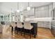 Stylish kitchen with white cabinets, large island, and stainless steel appliances at 245 Tumbling River Dr, Wendell, NC 27591