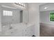 Bathroom boasting a double sink vanity and a view into the bedroom at 248 Robin Loop, Dunn, NC 28334