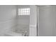 Elegant bathroom boasts a jetted tub and a separate shower, for a spa-like experience at 248 Robin Loop, Dunn, NC 28334