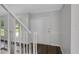Entry foyer with stairs and a white front door, complemented by modern flooring at 248 Robin Loop, Dunn, NC 28334