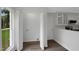 White laundry room with washer and dryer hookups and cabinets for storage at 248 Robin Loop, Dunn, NC 28334