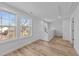 Upstairs loft with hardwood floors and large windows offering scenic views at 2513 Rochelle St, Durham, NC 27703